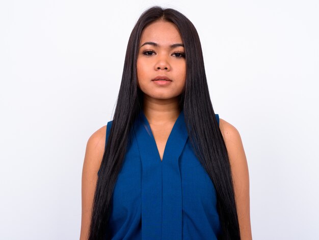 young Asian businesswoman against white space