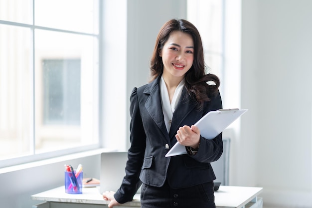 Young Asian businesswoman working at office