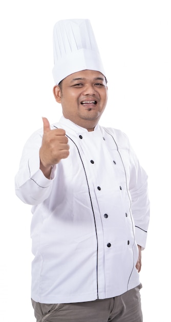  young asian chef smile while hand thumb up