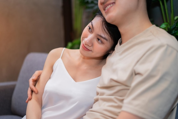 Young Asian couple at home