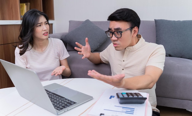 Young Asian couple at home