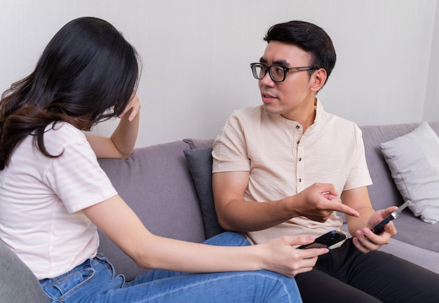 Young Asian couple at home