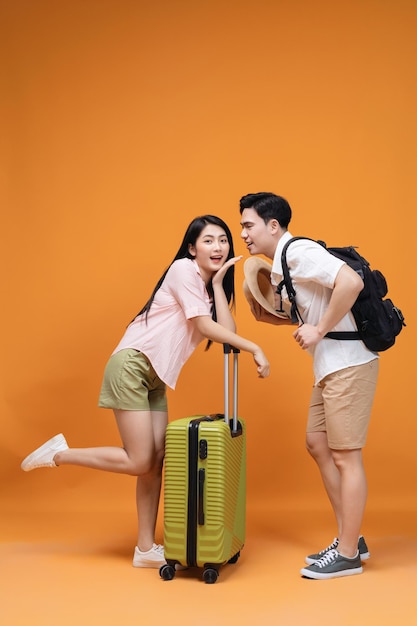 Young Asian couple travel concept background