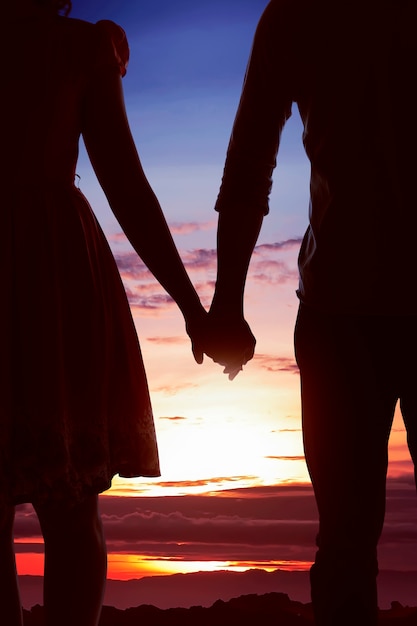 Young asian couple with holding hands together