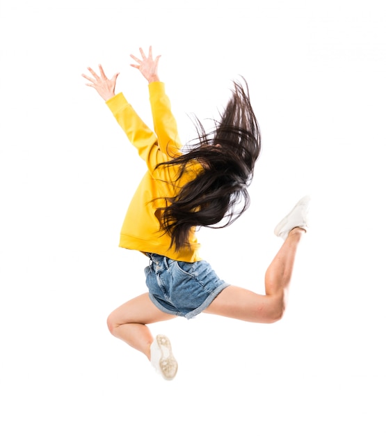 Young asian dancer over isolated white wall