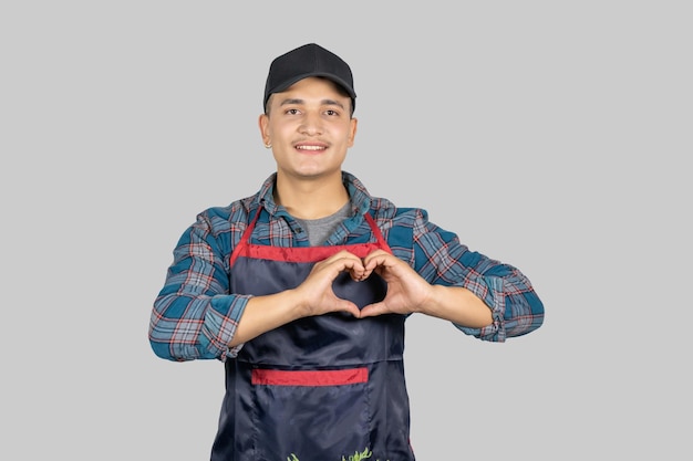 Young Asian Farmer in Apron from Nepal Giving Several Expressions and Gestures