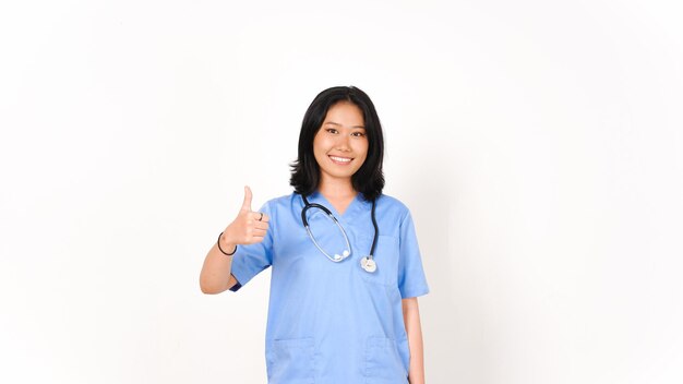 Young Asian female doctor showing thumbs up isolated on white background