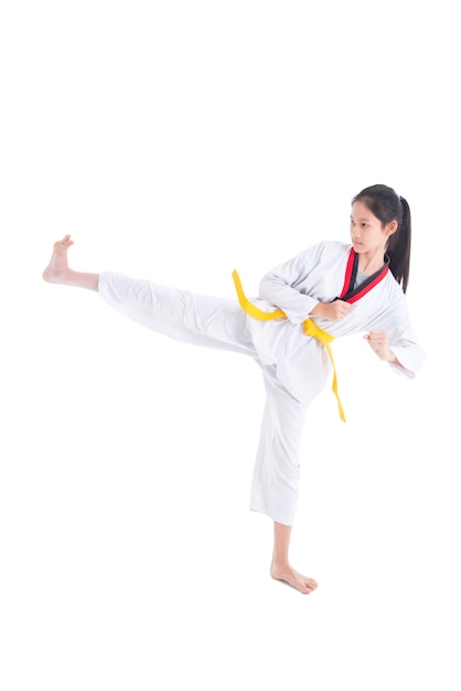 Young asian girl having taekwondo training