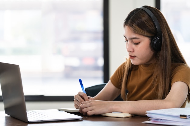 Young Asian girl students studying in classroom