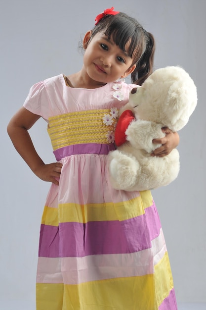 A Young Asian girl wearing dress