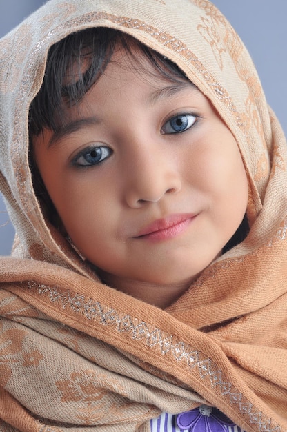 A Young Asian girl wearing Javanese Traditional Clothes