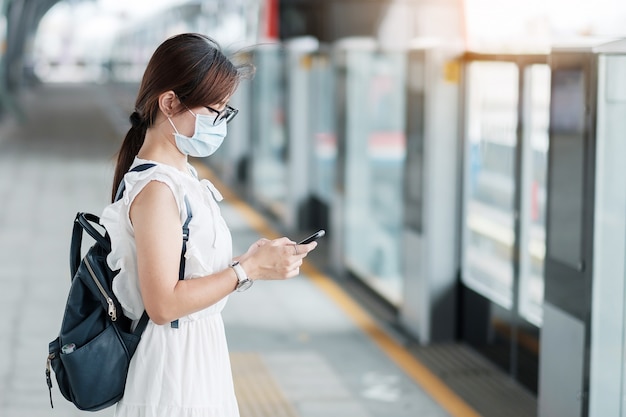 Young Asian girl wearing Surgical face mask protect coronavirus inflection