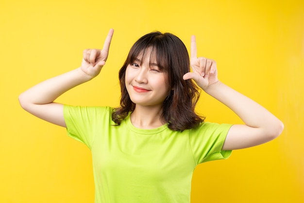 Young Asian girl with expressions and gestures