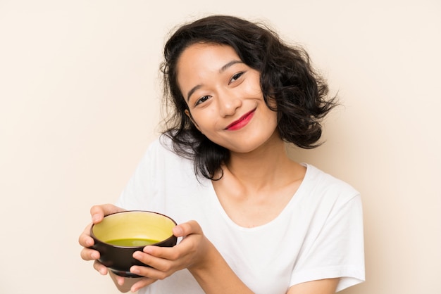 Young asian girl with tea matcha