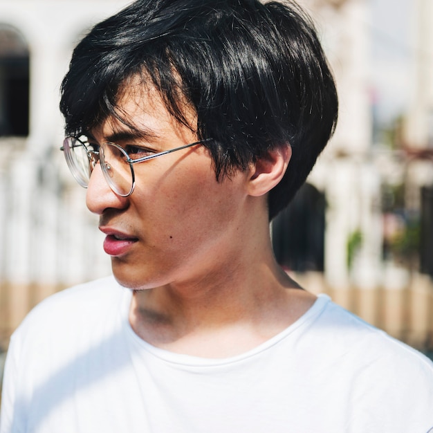 Young asian guy wearing glasses portrait