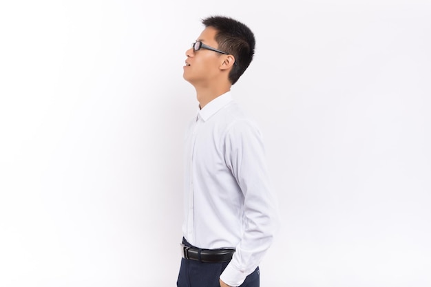 Young asian male in front of white background