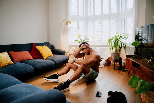 Young asian male working out indoors