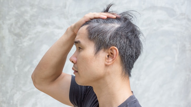 Premium Photo | Young Asian Man Has A Gray Hair.