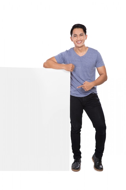 Young asian man holding a blank banner