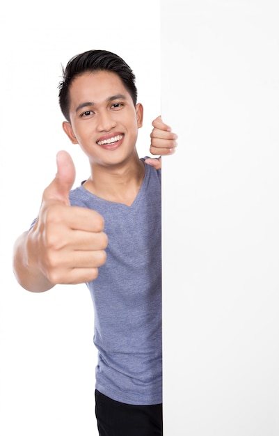 Young asian man holding a blank banner