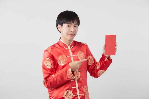 Young Asian man in mandarin collar dress 