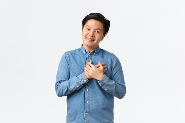 Young Asian man posing in the studio