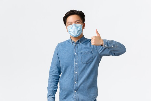 Young Asian man posing in the studio