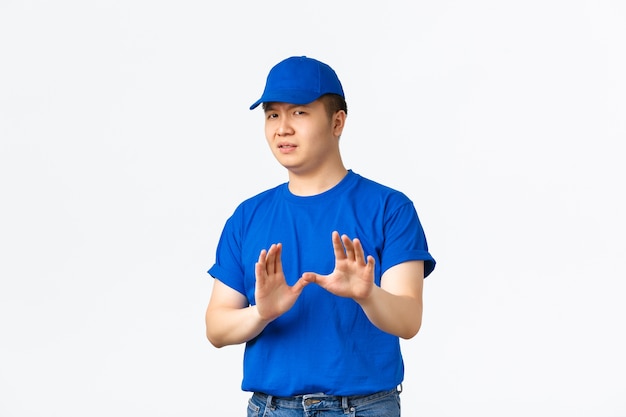 Young Asian man posing in the studio