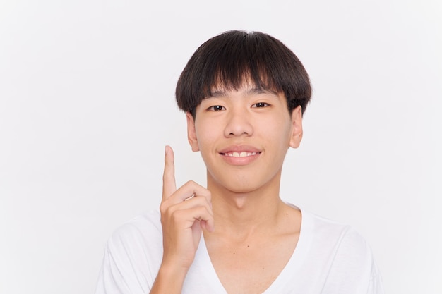 Young Asian man in a white t-shirt