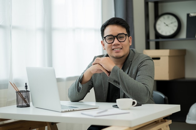 Young asian man working from home