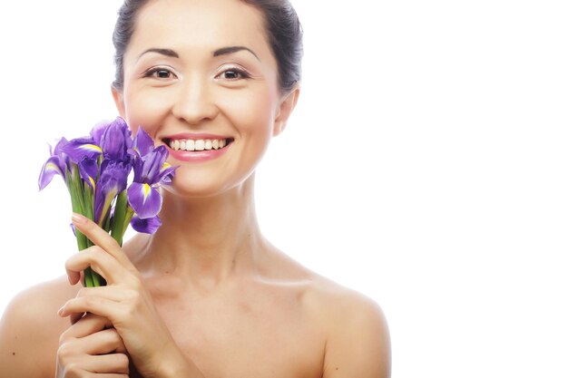 Young asian model with iris flowers