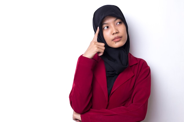 Young Asian muslim woman with a red dress