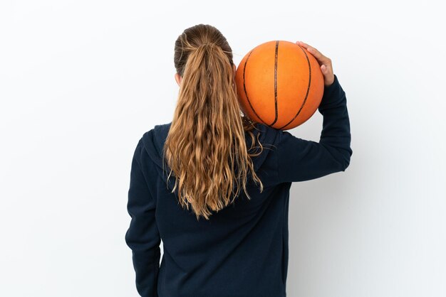 Young asian sport man over isolated blue background points finger at you with a confident expression