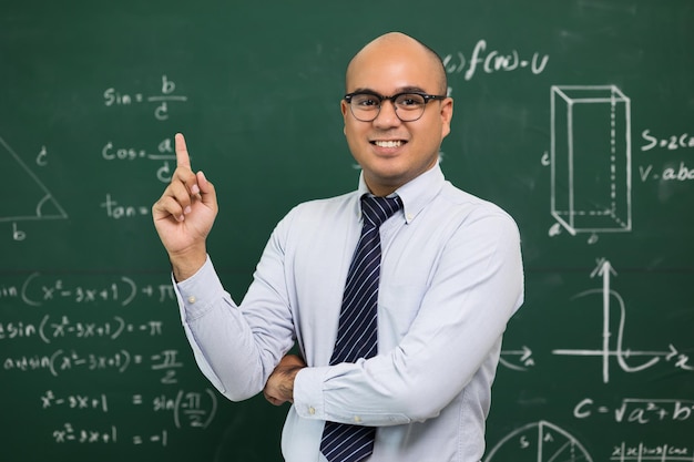 Young asian teacher man teaching video conference with\
student