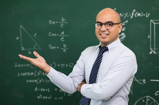 Young asian teacher man teaching video conference with student