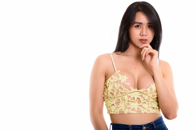 young Asian transgender woman thinking