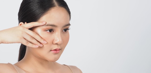 Young asian woman beauty face make up for skincare cosmetic