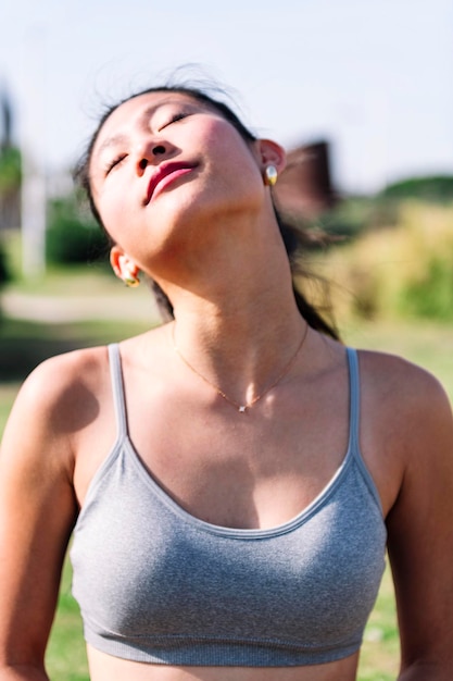 Young asian woman doing relaxation exercises