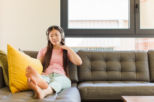 Young asian woman feeling stressed, anxious, tired and frustrated, pulling shirt neck, looking frustrated with problem