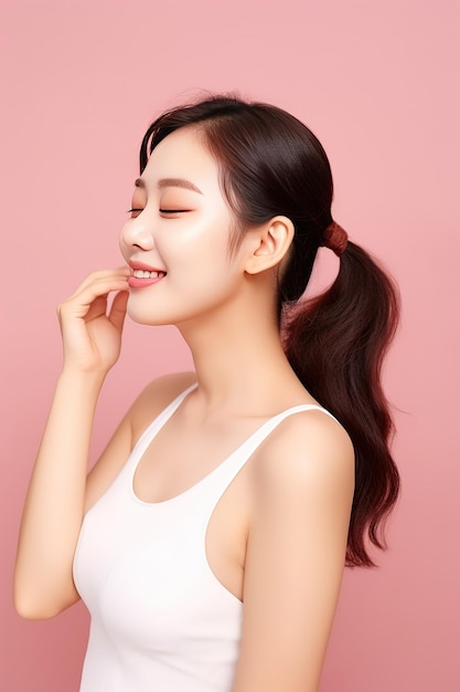 young asian woman gathered ponytail with natural makeup face have plump lips clean fresh skin wearin