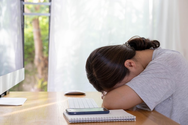 Young asian woman having an office syndrome health problem
after overworking for a long time. asian working woman suffer
injury at her neck. discomfort work place make people
uncomfortable.