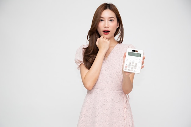 Young Asian woman holding calculator