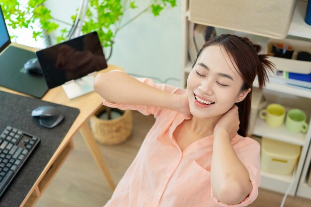 Young Asian woman at home