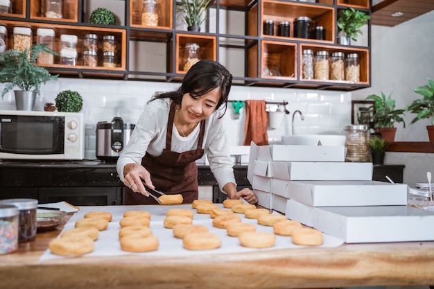 Young Asian woman in a modern kitchen