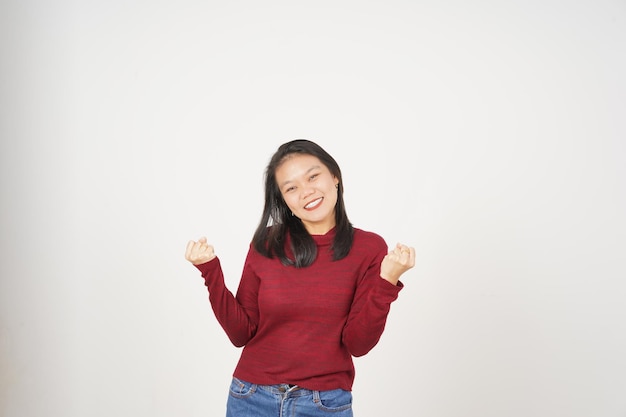 Young Asian woman in Red tshirt doing yes excited or celebration gesture isolated on white background