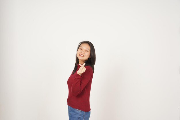 Young Asian woman in Red tshirt Showing korean love finger isolated on white background