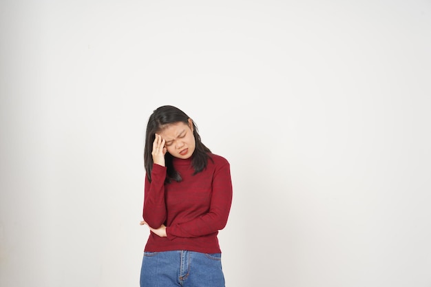 Young Asian woman in Red tshirt Suffering Headache gesture isolated on white background