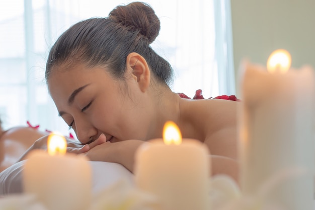 Young Asian woman relaxing in the Spa.