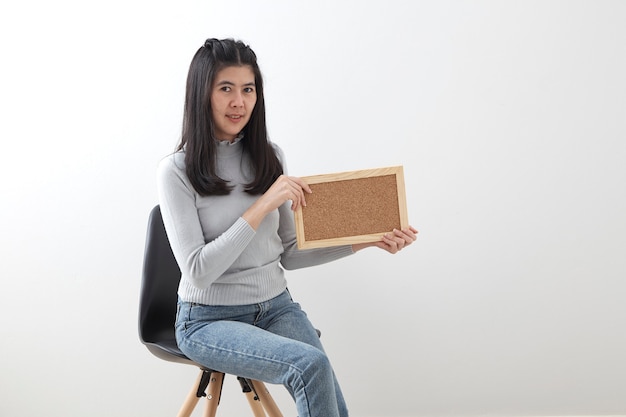 Young Asian woman sitting chair