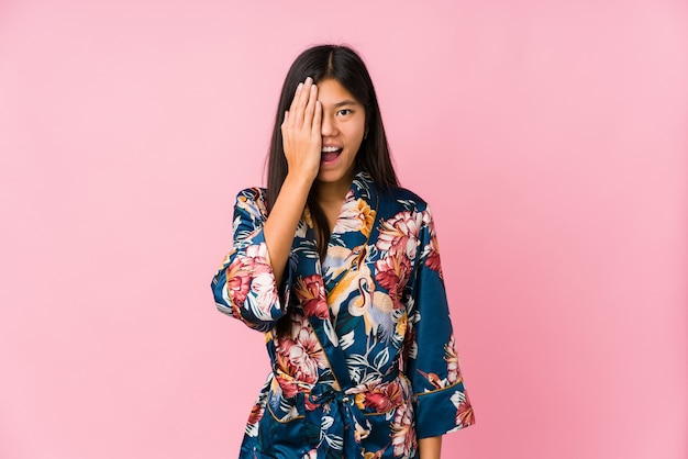 Young asian woman wearing a kimono pajamas